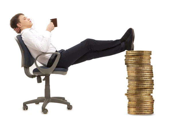 Businessman resting in armchair — Stock Photo, Image