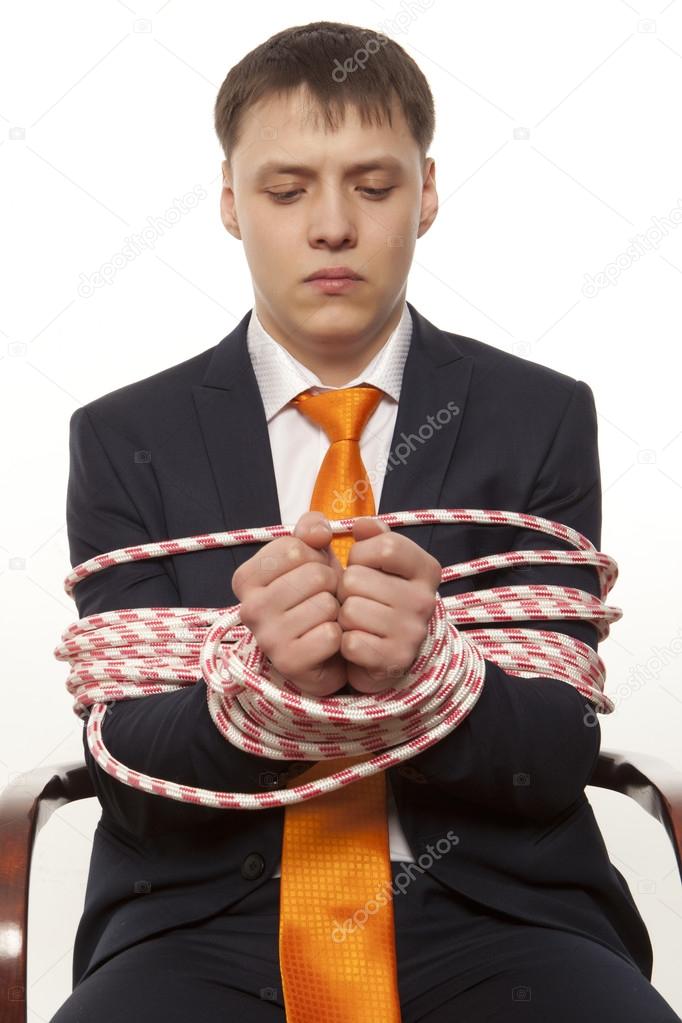 Businessman tied up
