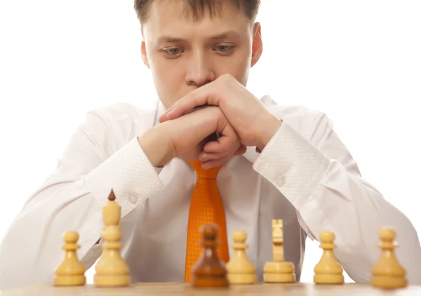 Businessman playing chess — Stock Photo, Image