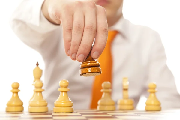 Businessman playing chess — Stock Photo, Image