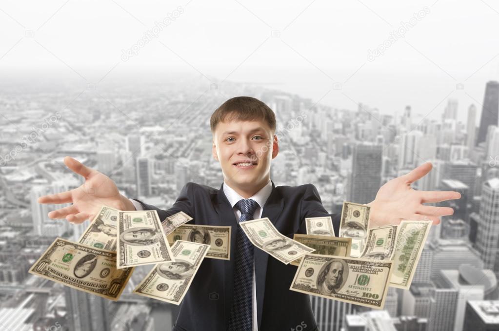 businessman throwing dollar