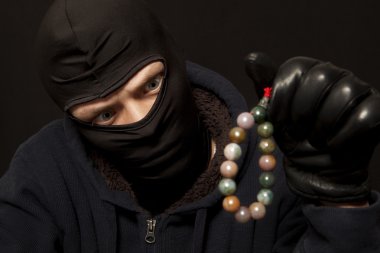 Thief with a necklace clipart