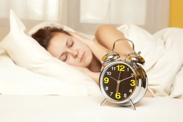 Woman sleeps in the bedroom — Stock Photo, Image