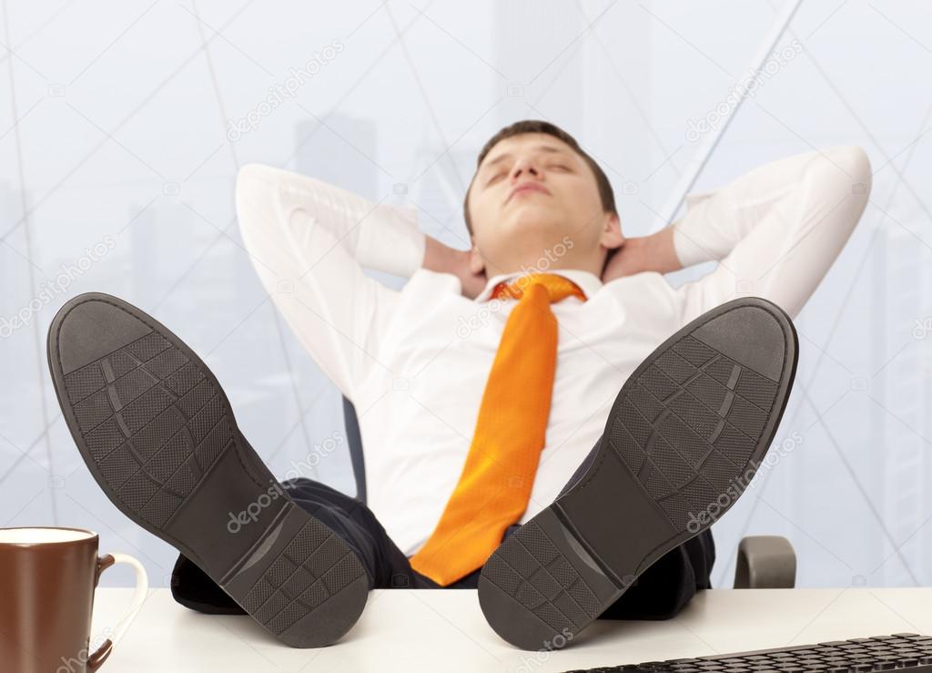Businessman sleeping at the office