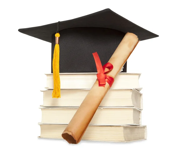 Graduation hat and diploma — Stock Photo, Image