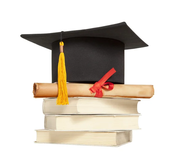 Graduation hat and diploma — Stock Photo, Image