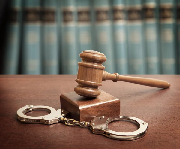 Gavel and handcuffs Royalty Free Stock Photos