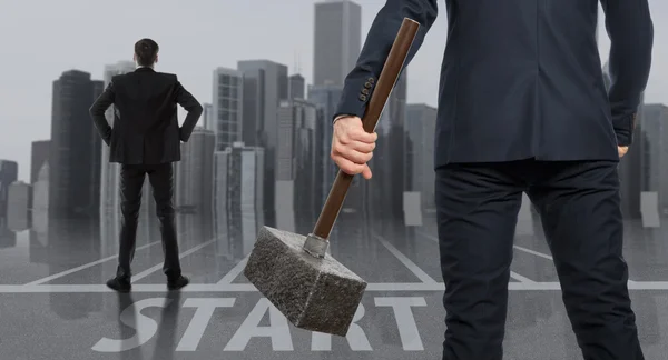 Startup. Determined businessman with hammer — Stock Photo, Image