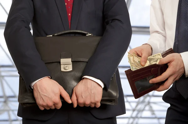 Businessman taking bribe — Stock Photo, Image