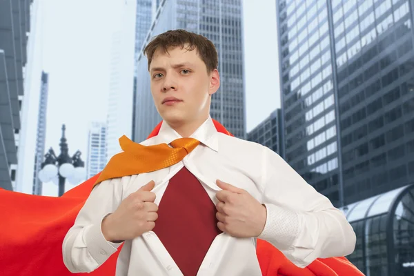 Businessman showing the superhero suit — Stock Photo, Image