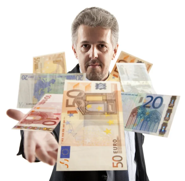 Businessman throwing euro — Stock Photo, Image