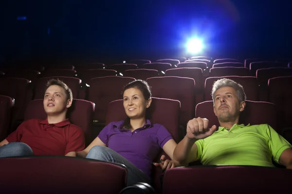 People sitting in movie theater