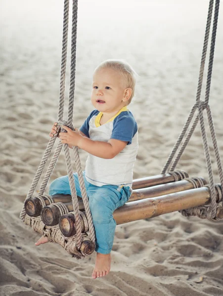 Baby on a swing — Stock Photo, Image
