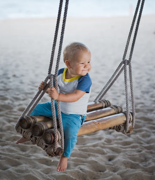 Baby on a swing — Stock Photo, Image