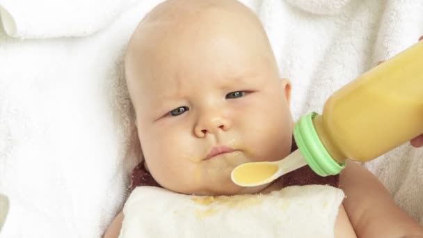 Baby Feeding With Spoon Feeder — Stock Video