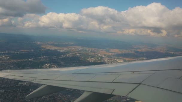Aerial view from the airplane on cumulus clouds — Stock Video