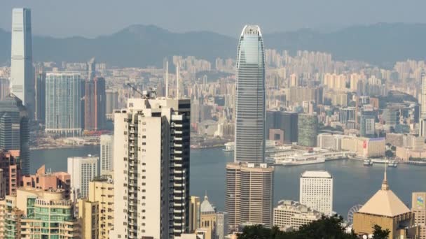 Hong Kong Central skyline e Star Ferry em Victoria Harbour — Vídeo de Stock