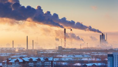 chimneys with smoke in the city