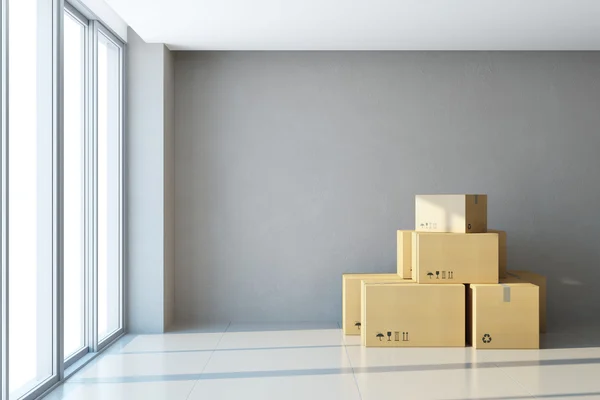 Moving boxes at a new office — Stock Photo, Image