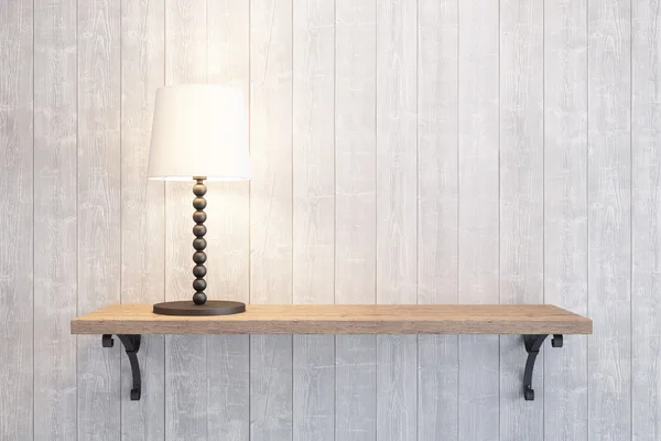 Acender a lâmpada de mesa na prateleira — Fotografia de Stock