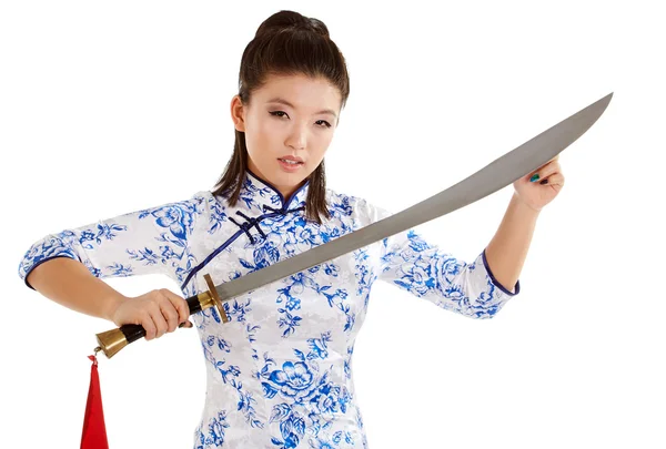 Beautiful woman holding sword — Stock Photo, Image