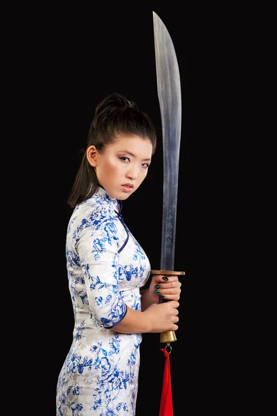 Beautiful woman holding sword — Stock Photo, Image