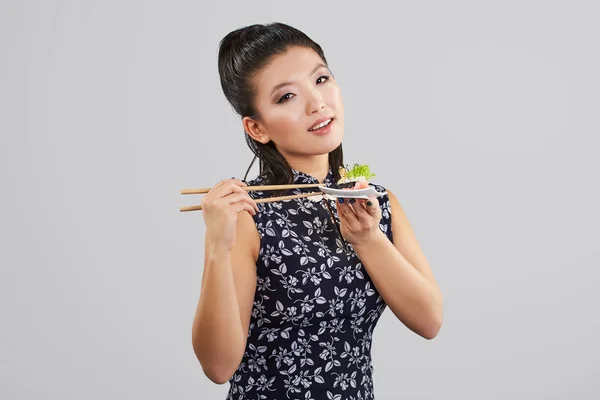 Sushi woman holding sushi — Stock Photo, Image