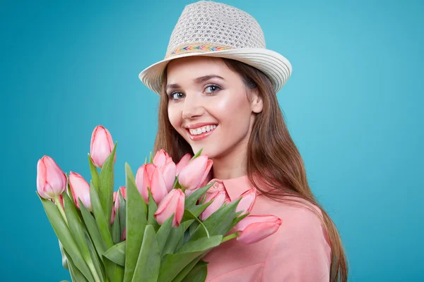 Mujer con tulipanes flores — Foto de Stock