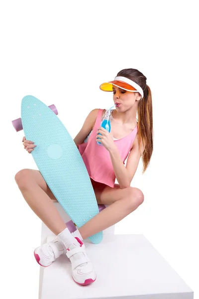 Fashion hipster girl with skateboard — Stock Photo, Image