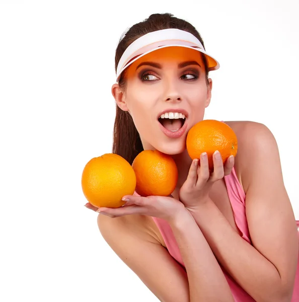 Mulher com laranjas — Fotografia de Stock