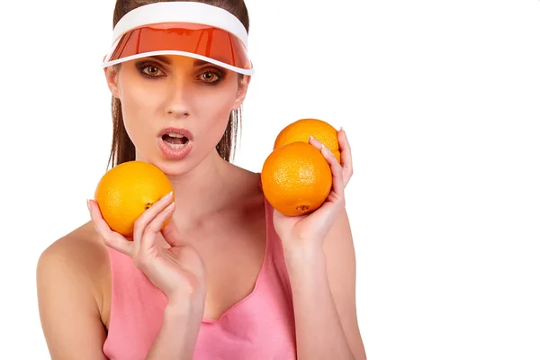 Giovane donna con arance — Foto Stock