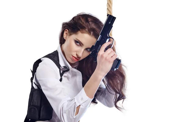 Flicka anläggning pistol — Stockfoto