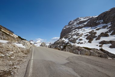 Road in Dolomites mountain clipart