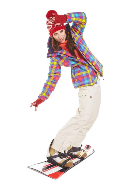 Mujer joven en snowboard — Foto de Stock