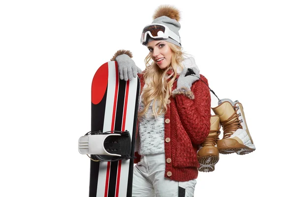 Vrouw staande bedrijf snowboard — Stockfoto