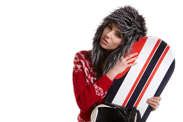 Hermosa mujer con una tabla de snowboard — Foto de Stock