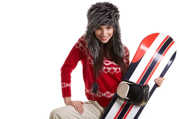 Όμορφη γυναίκα με ένα snowboard — Φωτογραφία Αρχείου