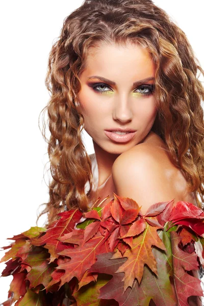 Woman dressed in red leaves — Stock Photo, Image