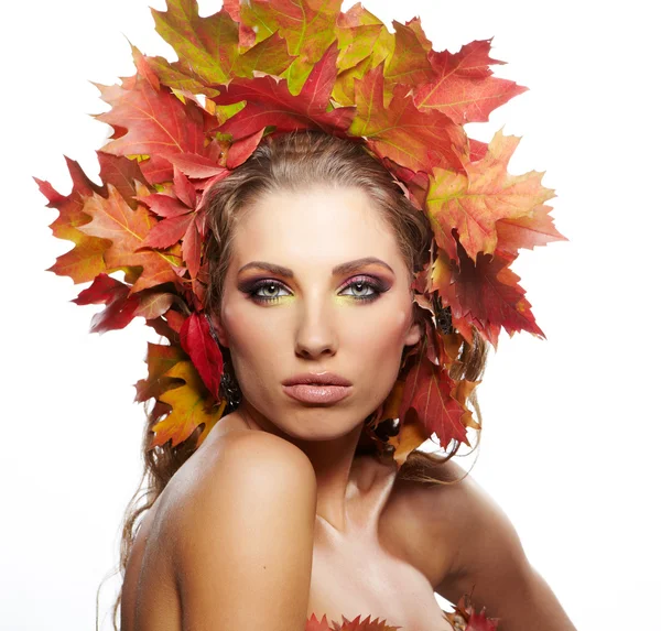 Woman dressed in red leaves — Stock Photo, Image