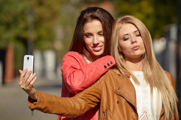 Beautiful young women making selfie — Stock Photo, Image