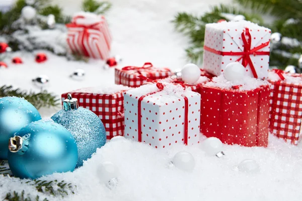 Christmas decorations on snow — Stock Photo, Image