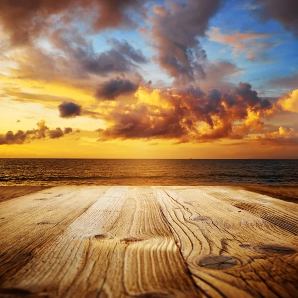 Old wooden table with sea scene — Stock Photo, Image