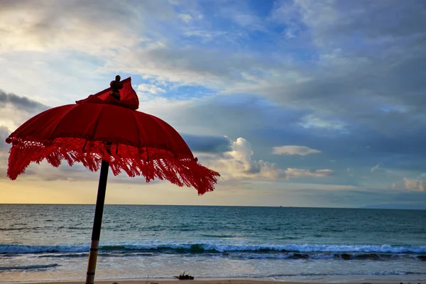 Red beach umbrella — Stock Photo, Image