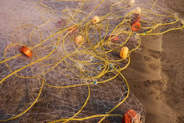 Fishing nets on the sand — Stock Photo, Image