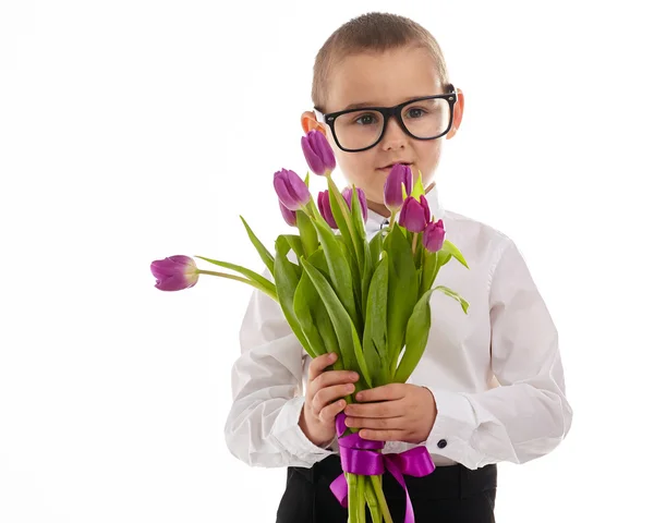 Malý kluk tulipány — Stock fotografie