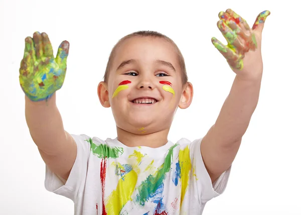 Garçon avec les mains peintes dans des peintures colorées — Photo