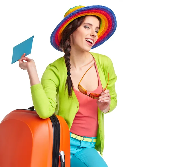 Tourist with travel suitcase and boarding pass — Stock Photo, Image