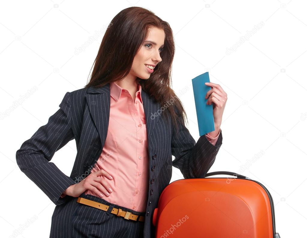 Businesswoman with a suitcase and a ticket