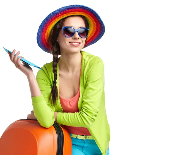 Portrait of female tourist with travel suitcase and boarding pas — Stock Photo, Image