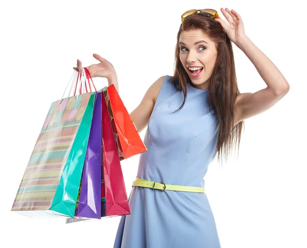 Mulher encantadora com sacos de compras — Fotografia de Stock